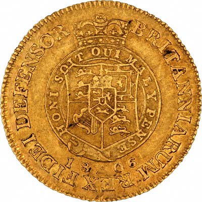 Shield in Garter on Reverse of 1806 George III Half Guinea. The garter inscription reads honi soit qui mal y pense. 